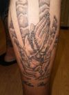 Praying hands tat